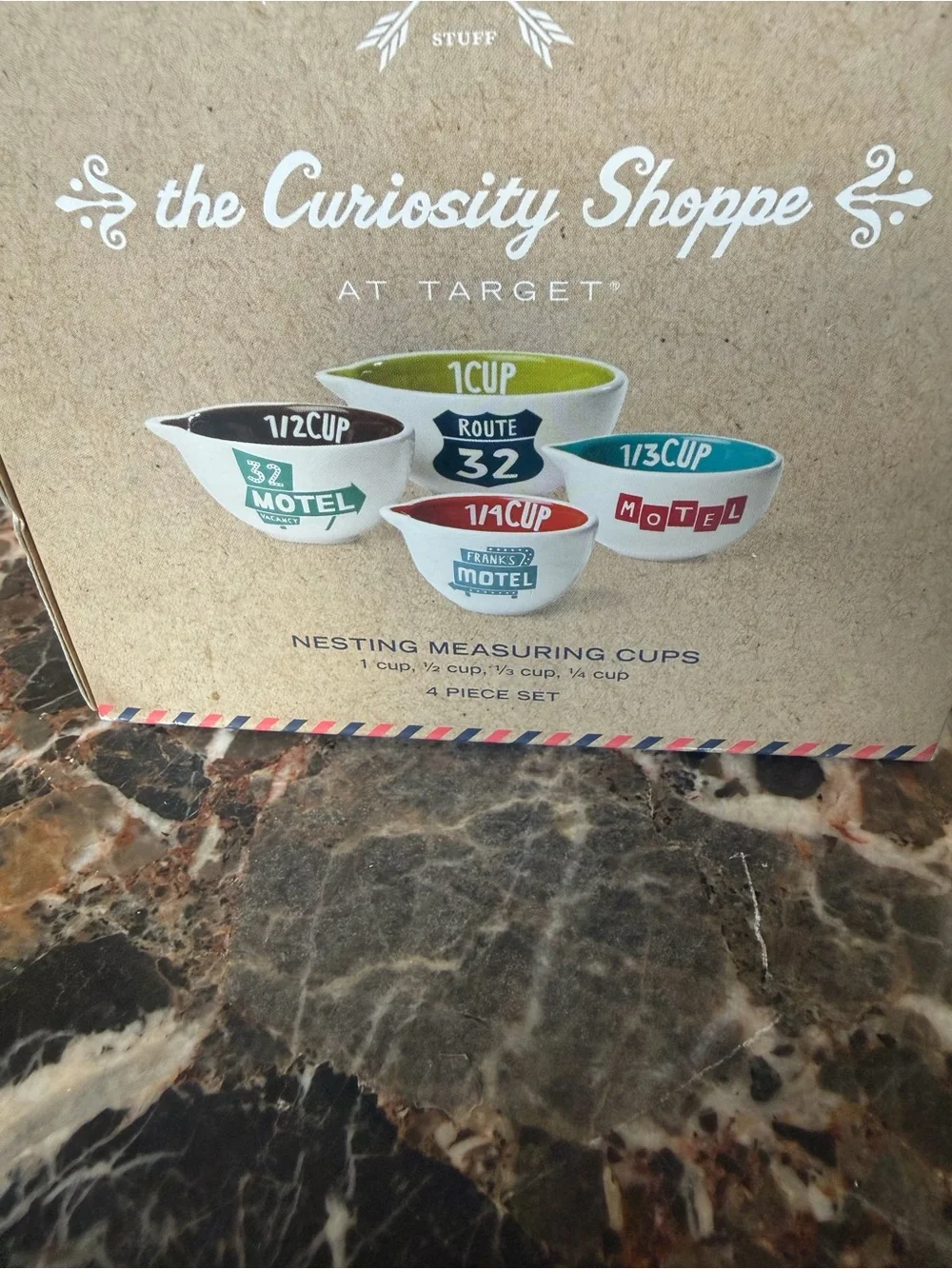 The Curiosity Shoppe Nesting Measuring Cups - Multicolor